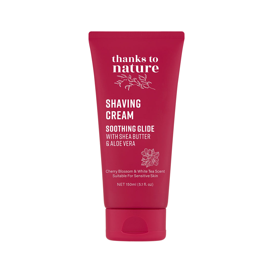A squeeze tube of 'thanks to nature' Cherry Blossom & white tea Shaving Cream on a solid white background.