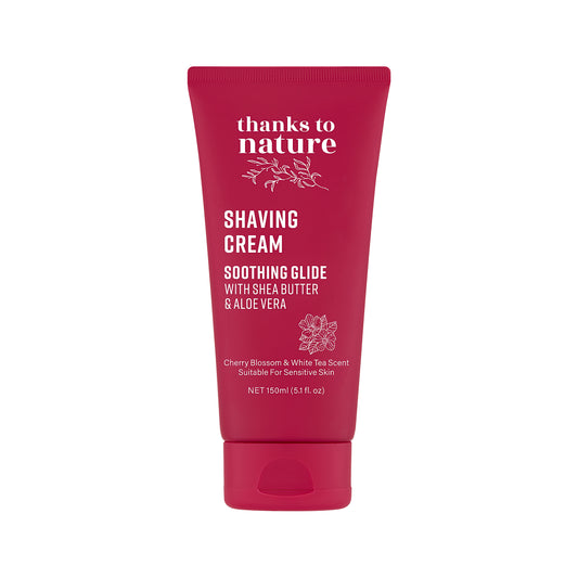 A squeeze tube of 'thanks to nature' Cherry Blossom & white tea Shaving Cream on a solid white background.