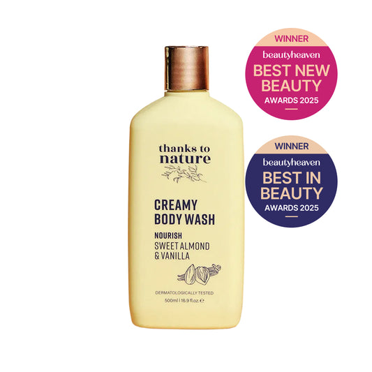 Thanks to Nature creamy body wash bottle with awards on a white background