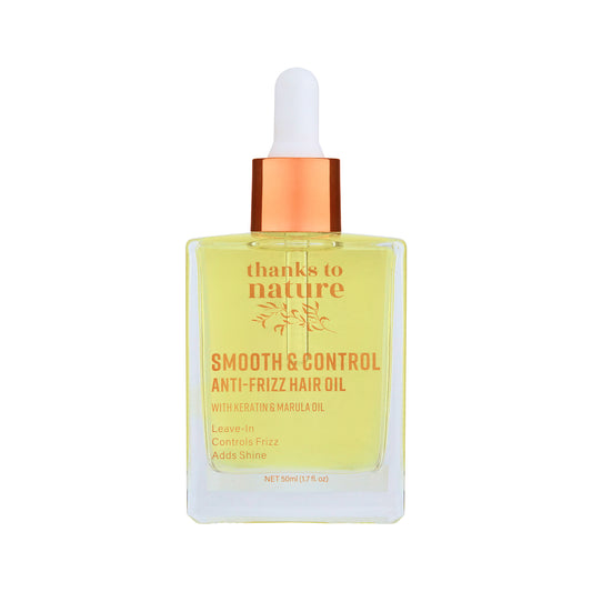 Bottle of 'thanks to nature' smooth & control anti-frizz hair oil with a dropper on a white background