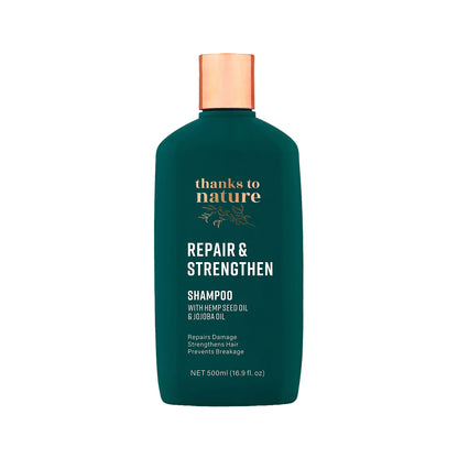 Green shampoo bottle with copper cap labeled 'thanks to nature' on a white background