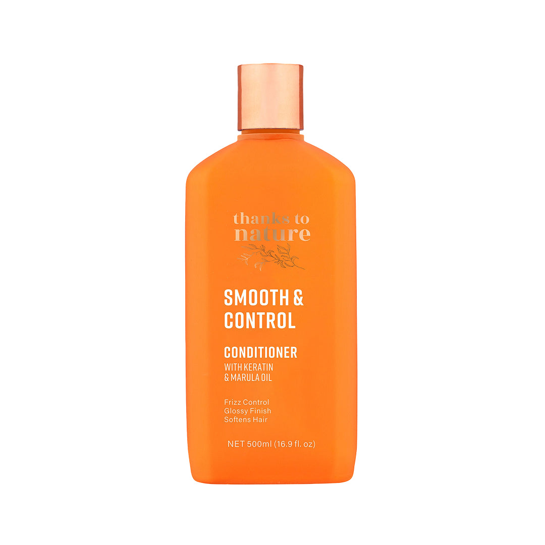 Orange conditioner bottle with 'thanks to nature smooth and control' branding on a white background
