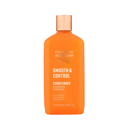 Orange conditioner bottle with 'thanks to nature smooth and control' branding on a white background